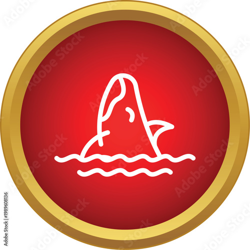 Orca whale breaching waves in a round red button with a gold rim