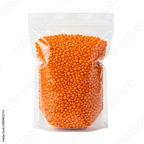 Bag of dried orange-colored couscous grains in a clear plastic pouch