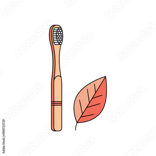 Toothbrush with orange leaf beside it.