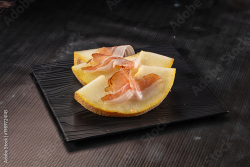 Tableau sur toile Slised sweet melon with Jamon