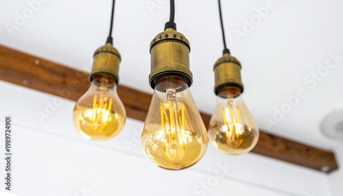 Vintage Edison Light Bulbs with Glowing Filaments Showcasing Warm Illumination and Industrial Photography Design