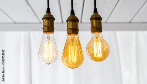 Vintage Edison Light Bulbs with Glowing Filaments Showcasing Warm Illumination and Industrial Photography Design