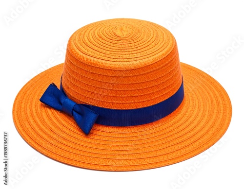 An orange sun hat with a blue ribbon and bow, shot against a white background. It's round and shows texture