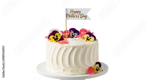 A beautiful white frosted cake decorated with fresh pansies and roses with a happy mothers day flag topper isolated on white background
