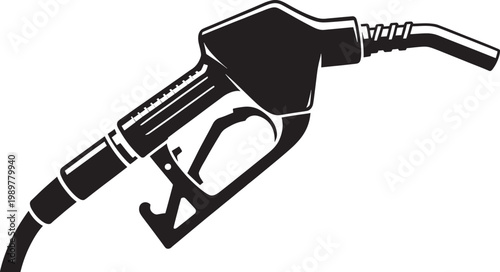 Close up silhouette of a fuel pump nozzle in black and white, dispensing gasoline at a gas station.