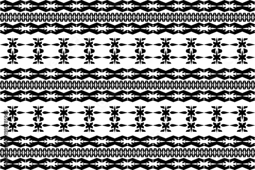 Bold black and white tribal-inspired geometric pattern with symmetrical stripes and ethnic motifs. Ideal for fabric, wallpaper, wrapping paper, and boho-style graphic design projects.