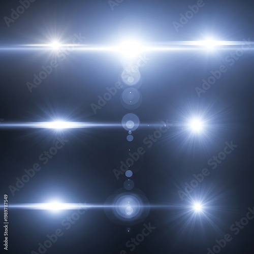 Several intense blue light flares and lens artifacts displayed against a dark background