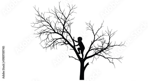 Child climbing a bare tree striking black form a dramatic silhouette
