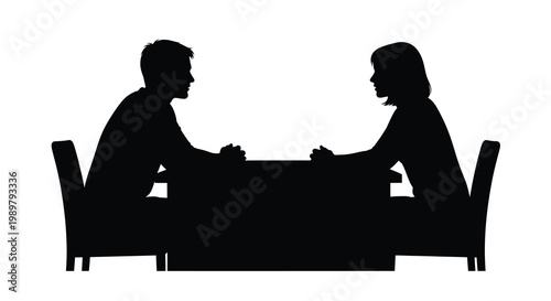 Couple seated across from each other at a table black silhouette