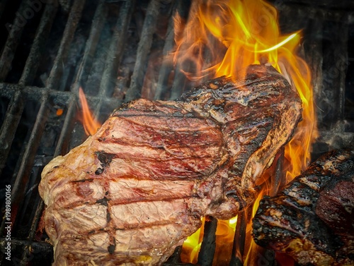Two sirloin steaks grilling on barbecue with flames and smoke, close up of beef steaks cooking over open fire, juicy meat searing on grill, outdoor BBQ food preparation