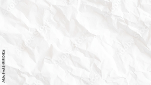 Crumpled white paper texture background with wrinkles and creases