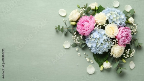 A beautiful bouquet of flowers on a light green background