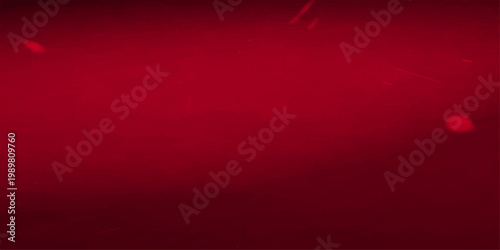 An abstract red background loop features a textured pattern with glowing particles and light design to create a vibrant wallpaper backdrop for art and film