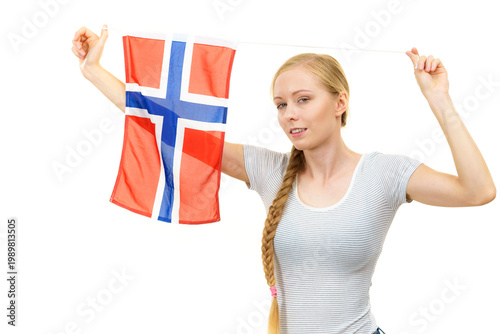 Young woman with norwegian flag