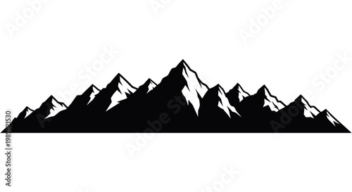 Silhouette of rugged snow capped mountain range against white background