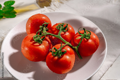 Fresh Tomatoes on a plate