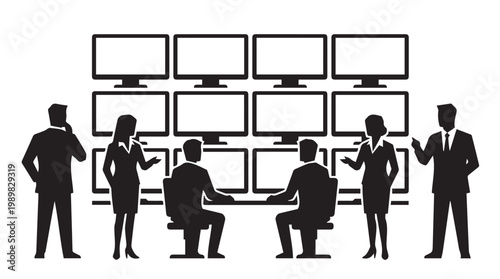 Business people in front computers.