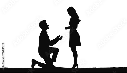 Couple captured in a romantic silhouette shows a man kneeling down to propose marriage to a woman in a classic and timeless moment of love, commitment, and future shared life together.