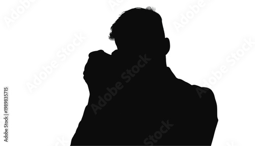 Photographer silhouette holds a camera to capture images, representing the professional creative process in a stylized and minimal black and white visual format.