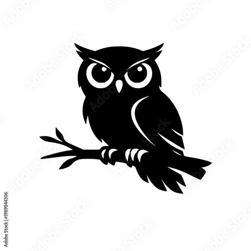 Bold Black Silhouette of an Owl Perched on a Branch