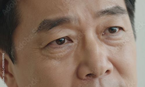 korean male face captures fine lines creases matured skin texture around eyes soft
