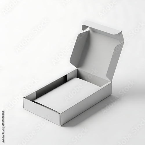 An open white cardboard box placed on a plain surface
