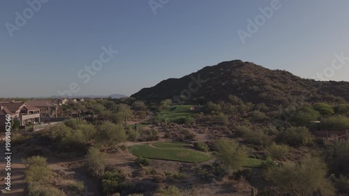 An aerial view of a mountainous golf course in Arizona during the spring.