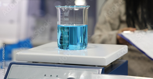 Sciene laboratory. Close up of Modern laboratory scenes with glassware tube reactors and colorful liquids in testing and analysis processes. Chemistry research pharmaceuticals biotechnology concepts.