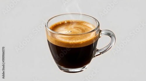 Fresh espresso coffee in clear glass cup with crema, hot steaming espresso shot on grey background, morning caffeine energy drink