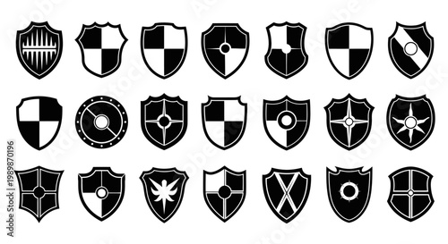 Collection of diverse black and white shield emblems and heraldic symbols representing protection strength and identity isolated on a clean white background for versatile design