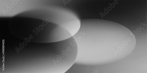  An ethereal composition featuring overlapping, translucent spheres, creating a play of light, shadow, and depth, rendered in shades of grey. 