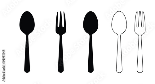 Cutlery arrangement displaying spoons and forks in a stark silhouette