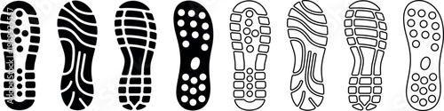 Collection of diverse shoe sole tread patterns and footprints isolated on a transparent background