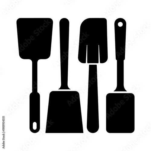 Set of kitchen spatulas and turners. Isolated black vector elements with transparent PNG background for cooking and bakery designs.