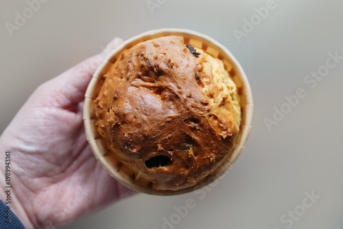 Easter cake without decoration in the hand