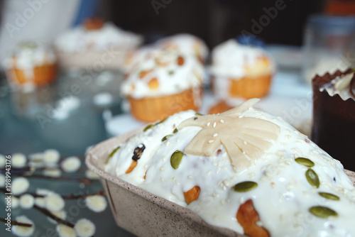 Easter cake with white topping and bird as a decoration                               
