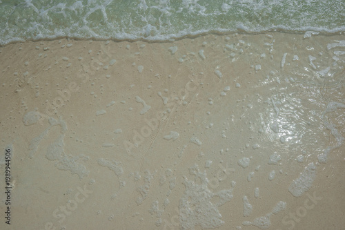 Waves rolling in over white sands in the Bahamas, New Grand Bahamas, The Bahamas