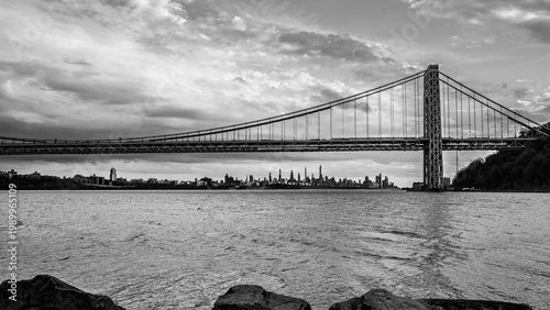 George Washington Bridge and Manhattan Skyline Over Hudson River in Black and White