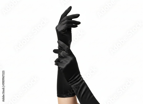Hands putting on black gloves in a bright setting