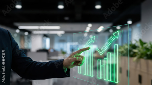 Businessman pointing at virtual screen with green glowing financial growth and profit margin charts in modern office environment, symbolizing success and progress