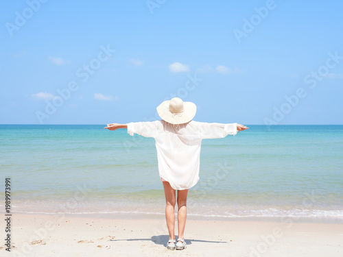 happy young woman on the beach