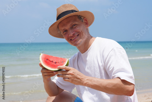 happy young man on the beach