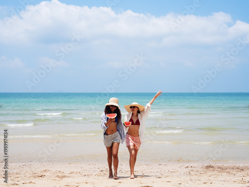 young teen playing and running on the beach