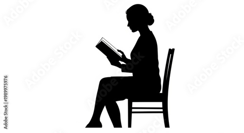 Silhouette of a woman sitting on a chair reading a book.