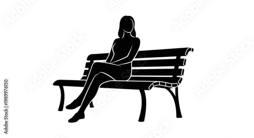 Silhouette of a Woman Sitting on a Park Bench.