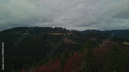 Unmanned Aerial Vehicle Captures Scenic Rural Ridge With Revealed Soil And Cloudy Weather Conditions