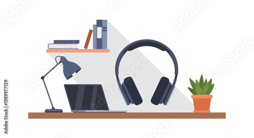 An organized modern desk setup featuring a laptop, a lamp, oversized headphones, and a potted plant, accented with long shadows.