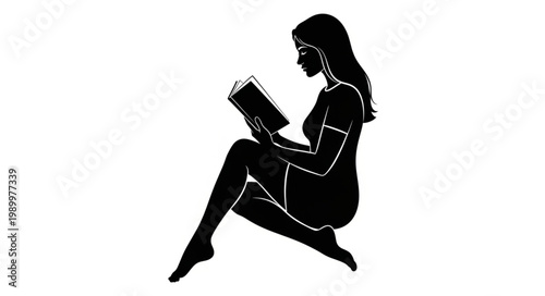 Silhouette of a woman reading a book.