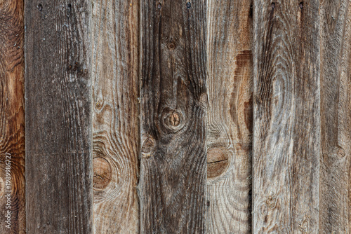 An abstract image of the rough texture of old weathered barn wood.  