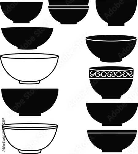 Black and white bowls with various kitchen tableware